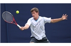 EASTBOURNE, ENGLAND - JUNE 14: Keelan Oakley of Great Britain plays a forehand against Jathan Malik of Great Britain during their Men's Singles first round qualifying match on day one of the Aegon International at Devonshire Park on June 14, 2014 in Eastbourne, England.  (Photo by Steve Bardens/Getty Images)